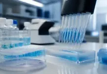 Eli Lilly Announces Acquisition of Merida Biosciences Lab bench with a multi-channel pipette dispensing blue liquid into a clear microplate